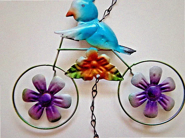 Bird on Bicycle with Bell metal hanging decoration has chain - 7in wide